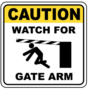 Caution : Watch for gate arm safety sign (CAU043)